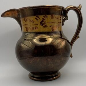 Antique Staffordshire copper lustreware jug/pitcher
